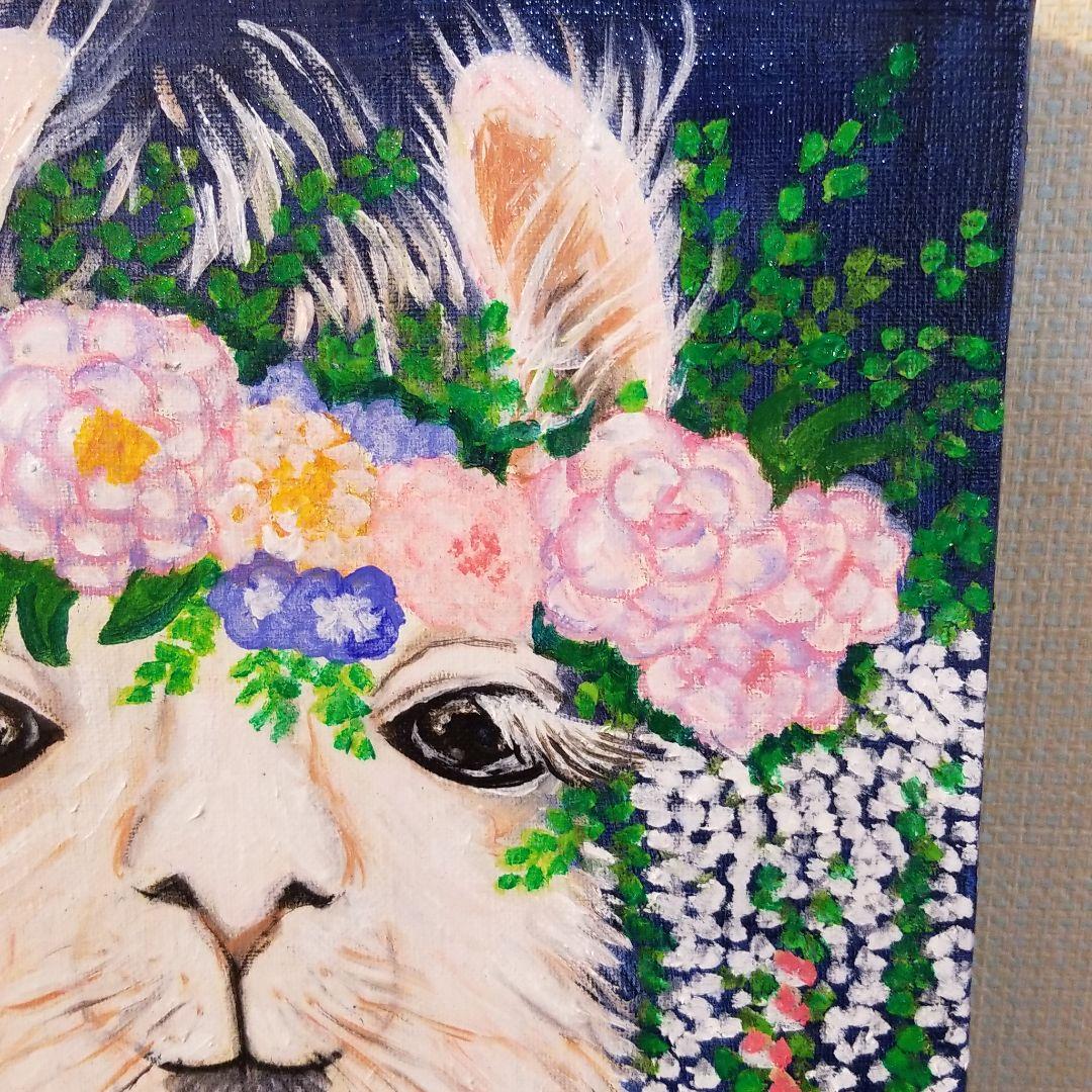 油絵　頭に花をのせたラマ