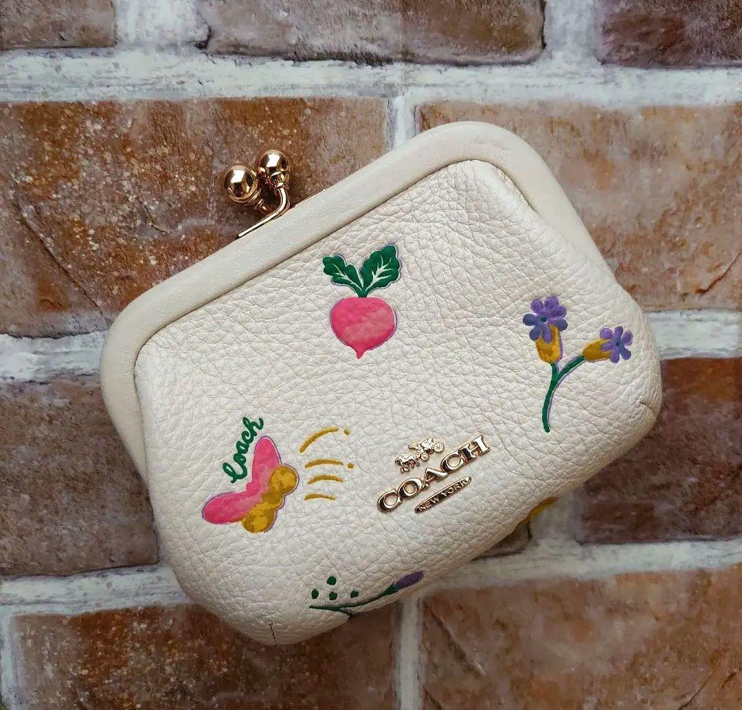 美品　COACHコーチ 財布 がま口 ノラキスロックケース 白