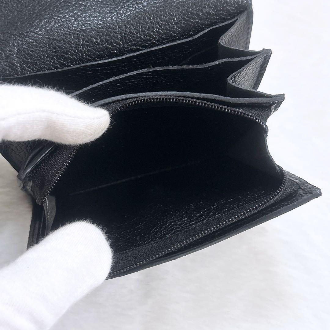 IL BISONTE シュリンクレザー 二つ折り財布 ロゴ刻印 フラップ 黒