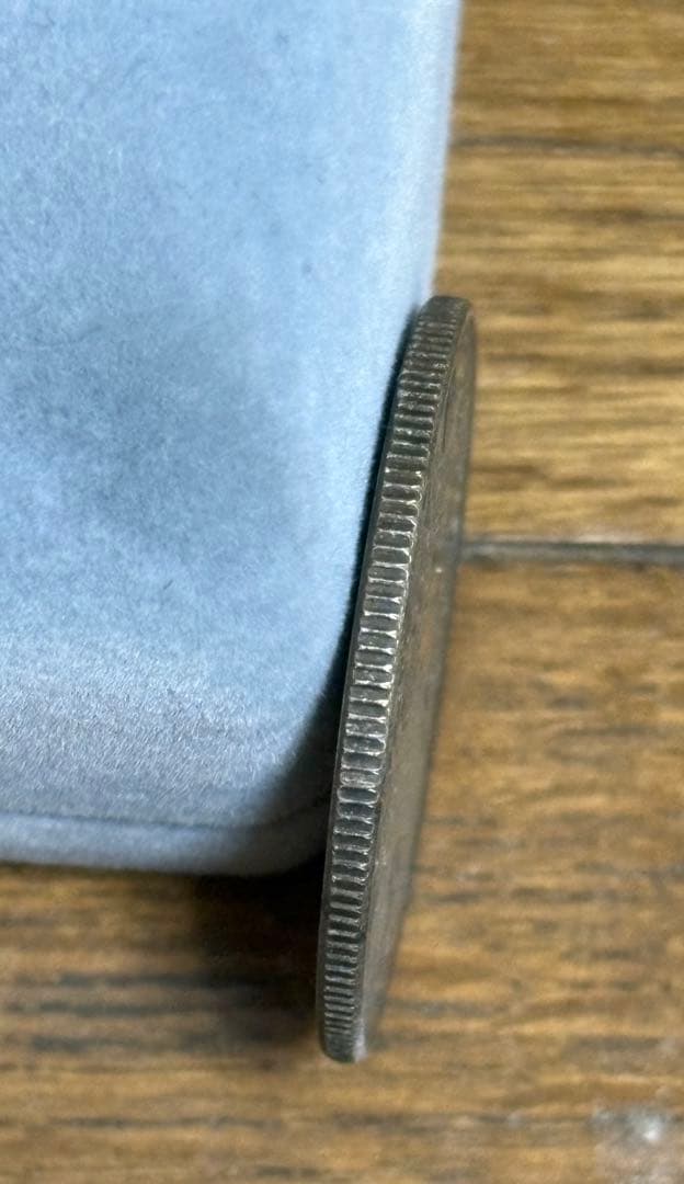 ファットマン50セントの古い中国の硬貨