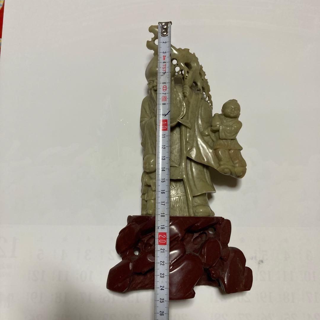 老人と子供の彫刻